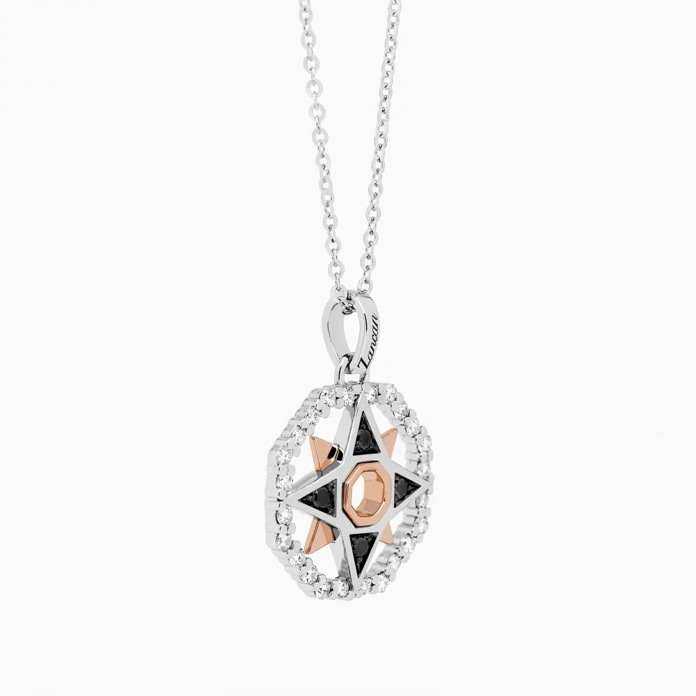 Collana  zancan in oro con pendente rosa dei venti e diamanti.