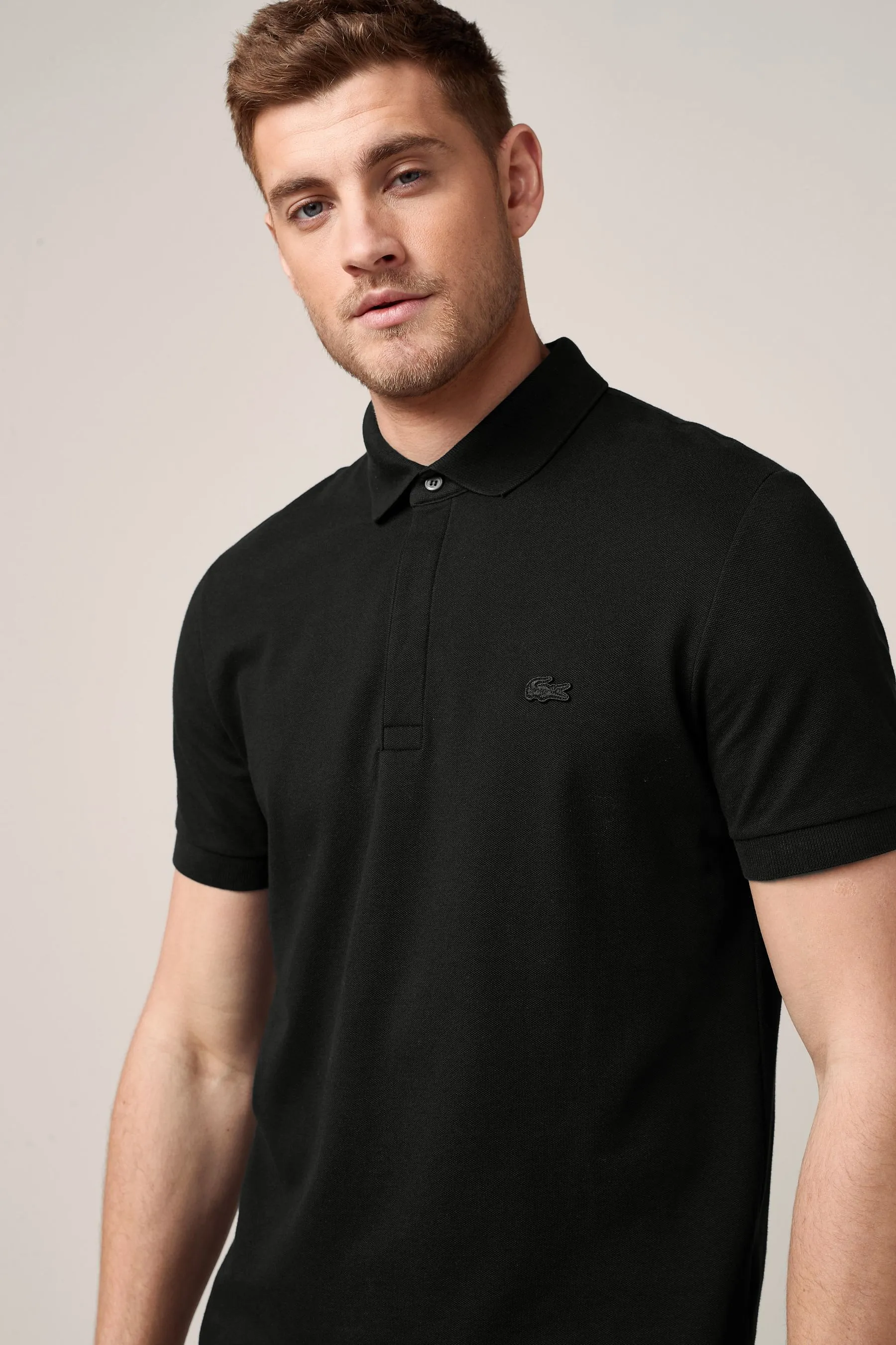 Lacoste - Paris - Polo con logo tono su tono    